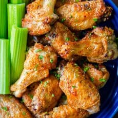 Air Fryer chicken wings in bowl with celery