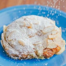 Easy Almond Croissants with crispy edges, crunchy nuts, and moist inside. Watch the video recipe for almond croissants. Melt-in-your-mouth delicious! | natashaskitchen.com
