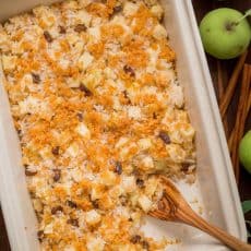 Apple rice pudding is Autumn comfort food. It is loaded with apples, cinnamon and a browned butter crunchy topping. A great way to use leftover white rice! | natashaskitchen.com