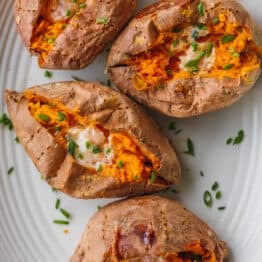 Baked sweet potatoes on serving platter