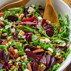 A show-stopping and flavorful beet salad with arugula with balsamic vinaigrette. It’s gluten free, vegetarian and perfect for entertaining.