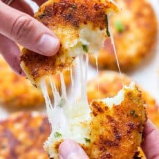 Cheesy mashed potato pancakes recipe - best way to use up leftover mashed potatoes! Mashed Potato Pancakes are crispy outside and loaded with melty cheese! | natashaskitchen.com