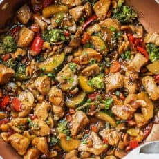 A 30-minute chicken stir fry recipe with an easy ginger honey soy sauce. Perfect easy dinner your whole family will enjoy. | natashaskitchen.com