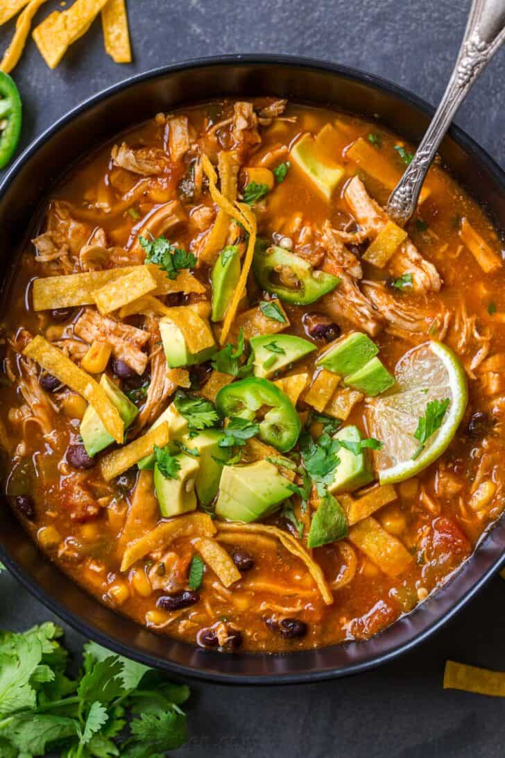 A bowl of tortilla soup with chicken