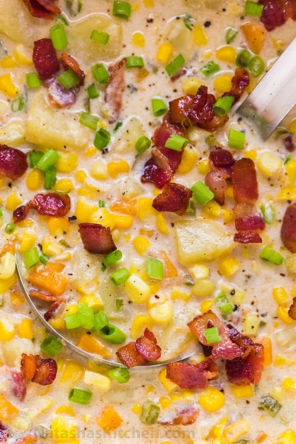 Creamy Corn Chowder garnished with bacon and chives