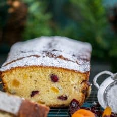 This sweet cranberry apricot loaf made our house smell like Christmas morning. It is soft, moist, crumbly and loaded with tang of cranberries and apricots.