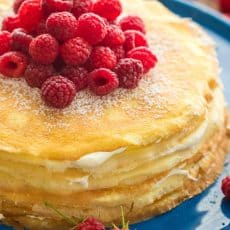 This crepe cake is beautiful and delicious! The fail-proof blender crepes recipe makes this the easiest 30 layer cake you'll make! Best crepe cake frosting! | natashaskitchen.com