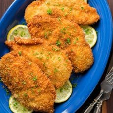 It's easier than ever to make this Chicken Kiev recipe. Slice through the crisp exterior of juicy Chicken Kiev and you'll get a stream of hot garlic butter. | natashaskitchen.com