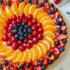 Whole fruit tart on platter