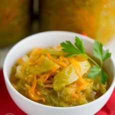 Green tomatoes in this canned green tomato salad are marinated and made into a salad with carrot and onion. They taste tangy and sweet. Give them a try.