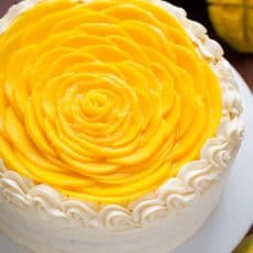 This mango cake is bursting with fresh mango flavor! An impressive, show-stopping mango cake recipe with only 9 ingredients. It is surprisingly simple. | natashaskitchen.com