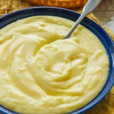 Large bowl of pastry cream with spoon