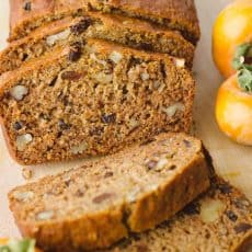 This Persimmon Bread Recipe is a keeper (in a make again and again sort of way)! Soft, moist, and every slice is studded with walnuts and raisins | natashaskitchen.com