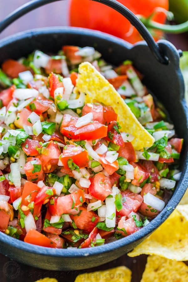 Pico De Gallo in a bowl served with tortilla chips