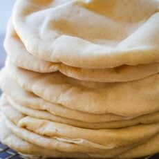 Pita Breads stacked on wire rack