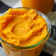 homemade pumpkin puree for dogs and for baking in glass jar