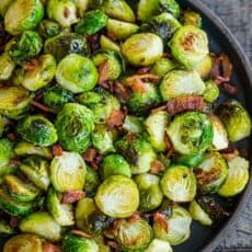 Roasted brussels sprouts in a bowl with bacon