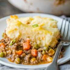 Shepherd's Pie slice on a plate with fork