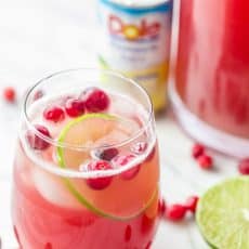 This Cranberry Pineapple Punch is crisp refreshing and loved by adults and kids. Perfect Christmas Holiday Punch! And it’s totally easy; just add and stir!