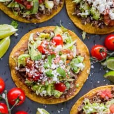 Tostadas served with lime wedges
