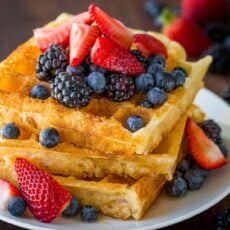 homemade waffles stacked on a plate