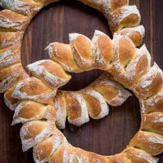 How to Make a Bread Wreath with DIY video! Wreath bread has a crisp crackly crust and super soft center. Surprisingly easy and impressive for Christmas! | Natashaskitchen.com